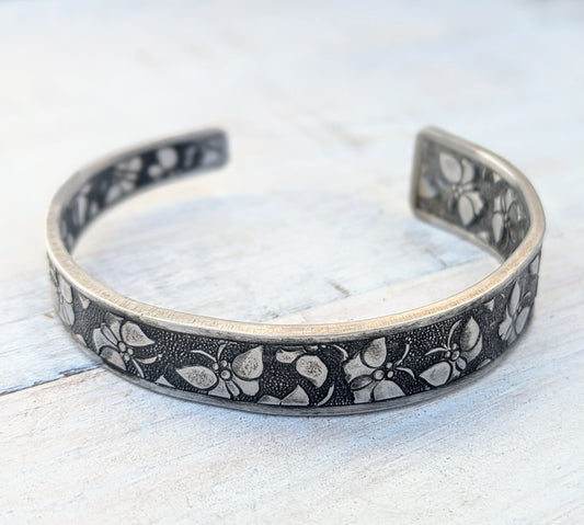 stainless steel cuff bangle with butterfly pattern