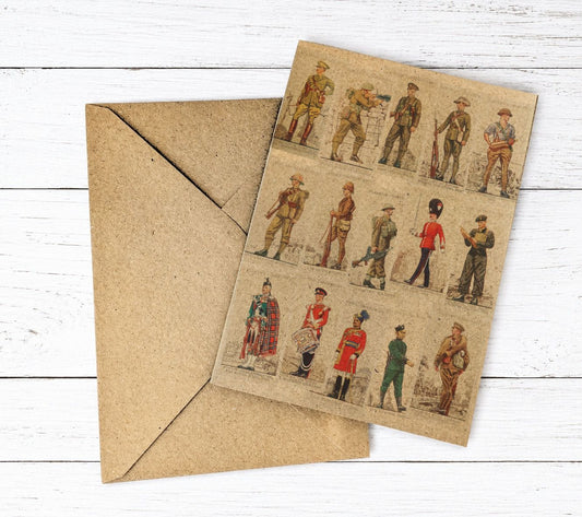 A square art print featuring vintage illustrations of soldiers in various uniforms, displayed on top of a brown kraft paper envelope against a white wood plank background.
