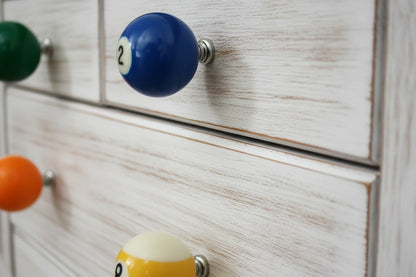 pool balls turned into drawer knobs available here